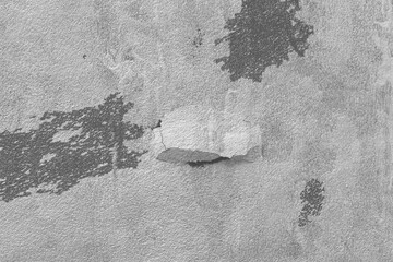 Gray black cracked concrete wall background or texture