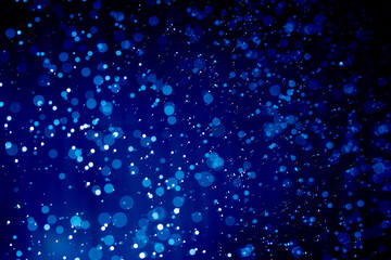 Abstract dark blue christmas glitter lights defocused bokeh