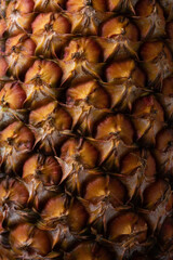 Ripe and orange pineapple peel, background texture. Macro texture.