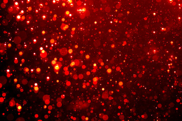 Fototapeta na wymiar Abstract red bokeh with black background