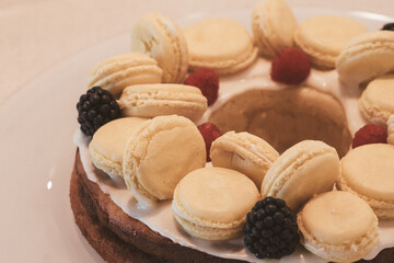 cheesecake with berries and macarons