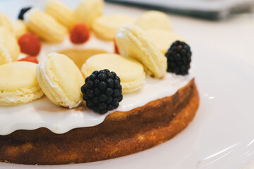 cheesecake with berries and macarons