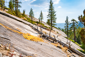 Steep slope of a half dome cliff, the picturesque nature of the Yosemite National Park