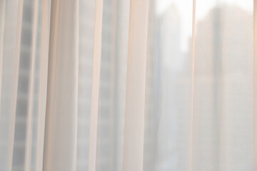 White curtains and morning sunlight