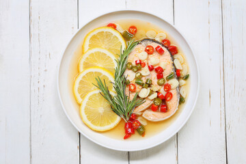 Steamed Salmon with Lemon and spicy of menu in thai foods.