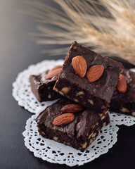 homemade chocolate brownies on dark background