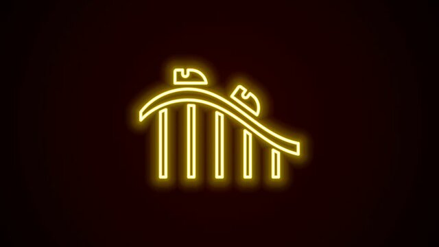 Glowing neon line Roller coaster icon isolated on black background. Amusement park. Childrens entertainment playground, recreation park. 4K Video motion graphic animation