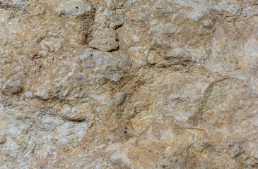 Natural mountain stone,a section of rock texture on a Sunny day.