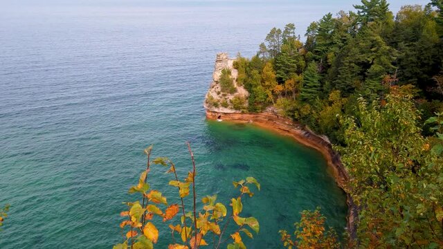 Miners castle point at Pictured rocks national lake shore in autumn time with Lake superior waves hitting the shore rocky shore line.