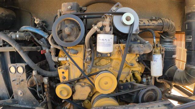 Large combustion engine on blocks and running