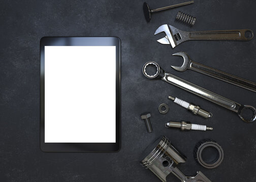 Car repair tool with tablet on Dark background. 3D illustration