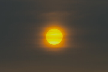 The sun, the sky sunset sun and clouds, bright twilight background. Everything lies above the surface of the atmosphere.