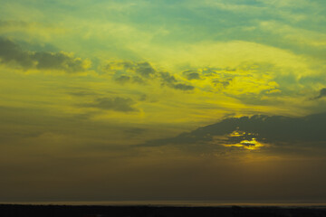 The sun, the sky sunset sun and clouds, bright twilight background. Everything lies above the surface of the atmosphere.