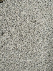 Grainy abstract uniform grainy surface. grey asphalt