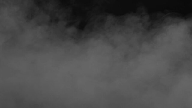 Real abstract steam, clouds, fog, vapor, ice, fire smoke over black background.