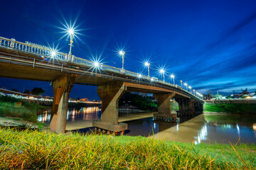 The color of Night traffic light on the road on the bridge (Eka Thot Sa Root Bridge) in Phitsanulok, Thailand.