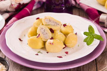 Potato gnocchi stuffed with radicchio and ricotta.
