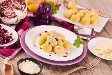 Potato gnocchi stuffed with radicchio and ricotta.