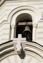 Cross and bell of the Church of the Resurrection built at an altitude of 412 meters over the...
