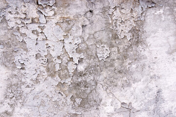Decorative plaster. old the cracks of the destroyed building texture