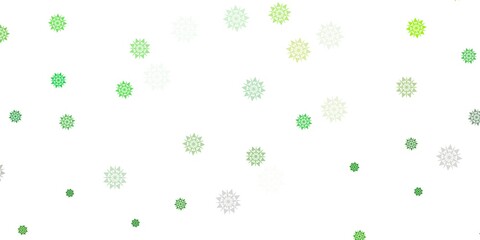 Light green, yellow vector texture with bright snowflakes.