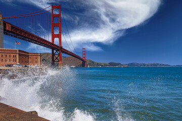 Waves crashing beneath the iconic Golden Gate Bridge in San Francisco, CA