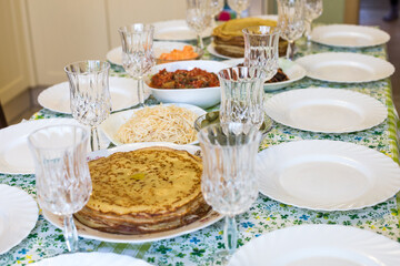 
The table set for the feast of the pancakes.