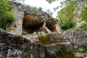 Houses built in caves in the famous ancient city-fortress Chufut-Kale ("Jewish Fortress" in Turkish) built in 5th - 6th century in the Crimean Mountains, now lies in ruins