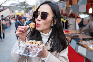 Takoyaki japanese food on the street to Fushimi Inari shrine at Kyoto,Japan.