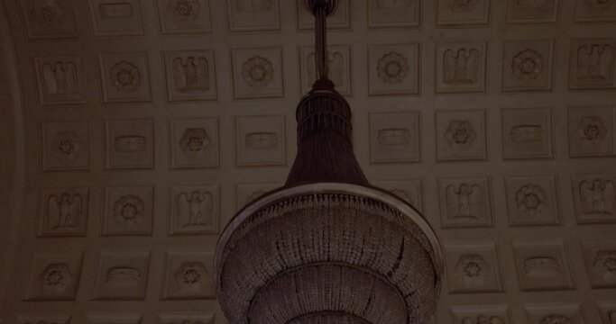 View of the ancient chandelier of the Sala Reale, room at Milan central station