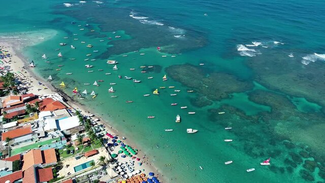 Seascape of Porto de Galinhas, Pernambuco, Brazil. Beach life scene. Beachfront view. Seascape of Porto de Galinhas, Pernambuco, Brazil. Beach life scene. Beachfront view. Seascape view.