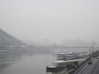 Naklejka premium Exploring the beautiful snow covered old city of Budapest during winter, Hungary