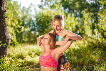 Expert masseuse provides a thorough massage on the ground.