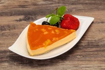 Cheesecake with apricot served strawberry