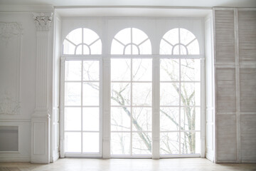Arched windows in a chic hall.