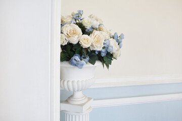 Delicate floral arrangement of artificial flowers in the interior.