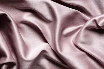 Pink textile abstract background. Close up 