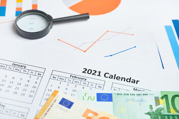 Successful 2021 in generating profits for businesses with the euro currency on paper charts