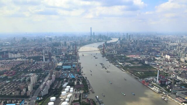 Modern Cityscape And Traffics In The Sunny Day Shanghai Downtown Buildings. Lujiazui Financial District Skyline And Skyscrapers Far Away. Business Finance Travel Concept Footage. Huangpu River China