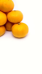 Tangerines on a white background, isolated, copy space, top view, close-up