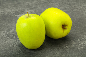 Two ripe green sweet apples