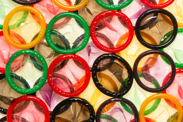 Colorful condoms background.