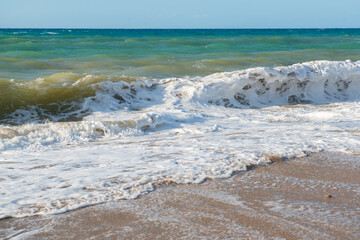 Beach in Sicily Italy. Mediterranean sea coast. Waves