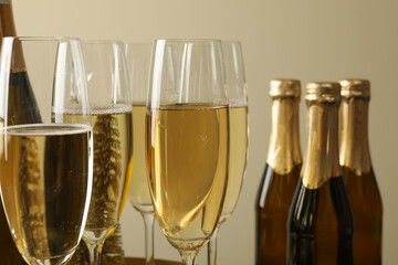 Bottles and glasses of champagne, close up