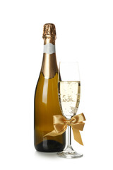 Bottle and glass of champagne isolated on white background