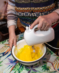Senior woman baking homemade  cake