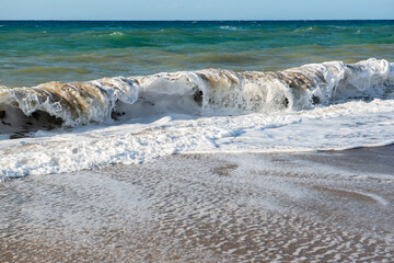 Beach in Sicily Italy. Mediterranean sea coast. Waves