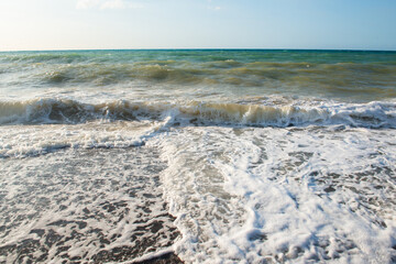 Beach in Sicily Italy. Mediterranean sea coast. Waves