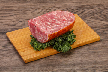 Beef ham piece over board