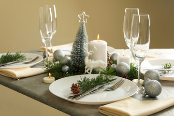 Concept of romantic New year table setting on gray table